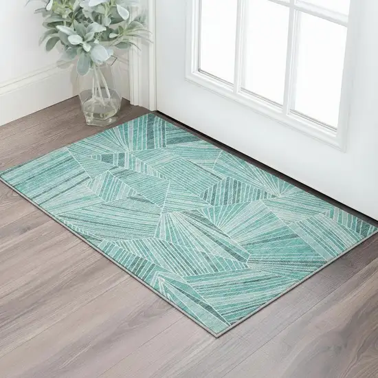 Teal And Ivory Geometric Washable Area Rug With UV Protection Photo 2