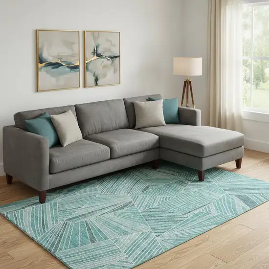 Teal And Ivory Geometric Washable Area Rug With UV Protection Photo 1