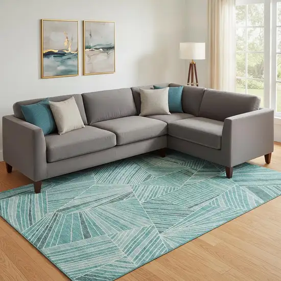 Teal And Ivory Geometric Washable Area Rug With UV Protection Photo 1