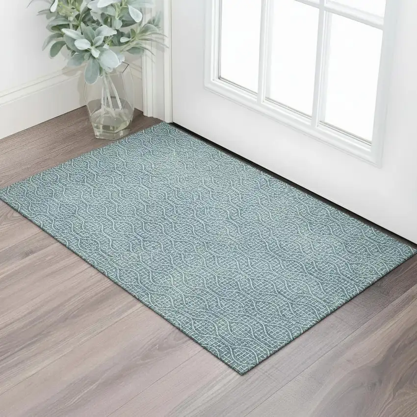 Teal And Ivory Geometric Washable Area Rug With UV Protection Photo 1