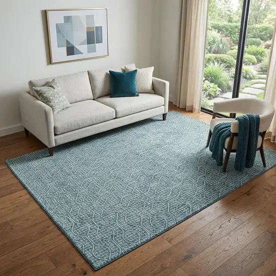Teal And Ivory Geometric Washable Area Rug With UV Protection Photo 1