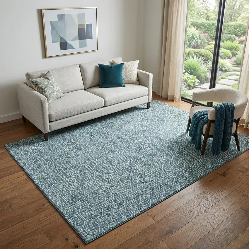 Teal And Ivory Geometric Washable Area Rug With UV Protection Photo 1