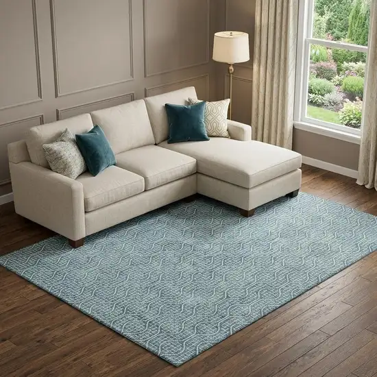 Teal And Ivory Geometric Washable Area Rug With UV Protection Photo 1