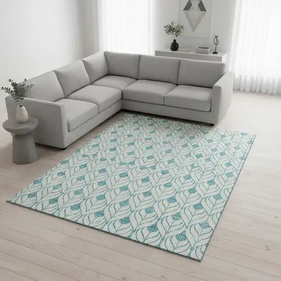 Teal And Ivory Geometric Washable Area Rug With UV Protection Photo 2