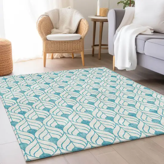 Teal And Ivory Geometric Washable Area Rug With UV Protection Photo 4