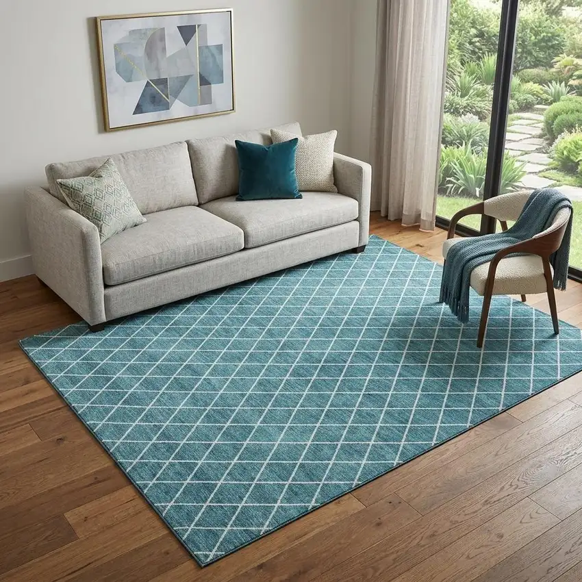 Teal And Ivory Geometric Washable Area Rug With UV Protection Photo 1