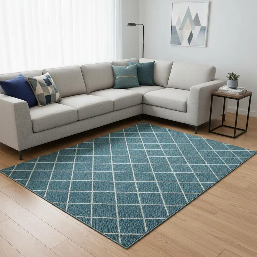 Teal And Ivory Geometric Washable Area Rug With UV Protection Photo 2