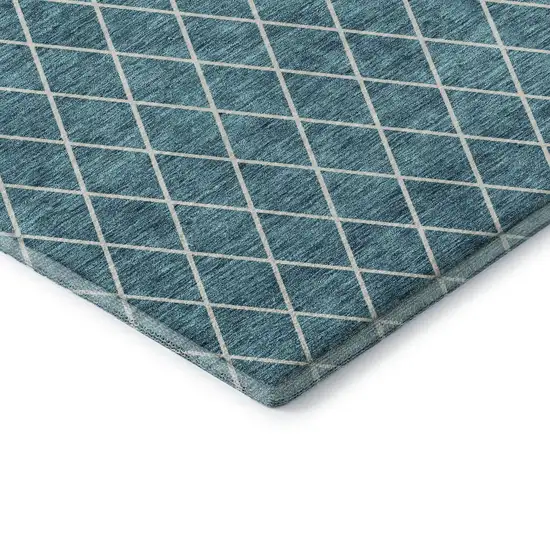 Teal And Ivory Geometric Washable Area Rug With UV Protection Photo 1