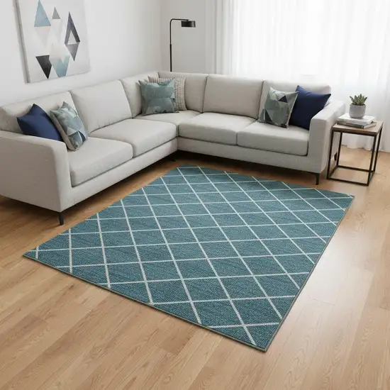 Teal And Ivory Geometric Washable Area Rug With UV Protection Photo 2