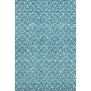Photo of Teal And Ivory Geometric Washable Area Rug With UV Protection