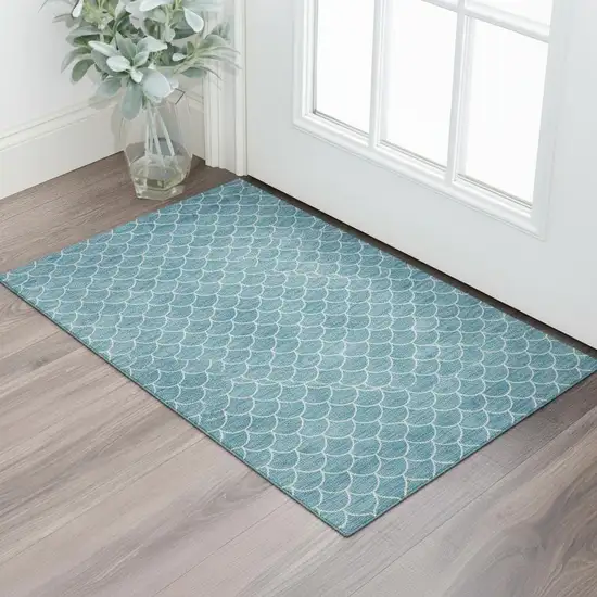 Teal And Ivory Geometric Washable Area Rug With UV Protection Photo 1