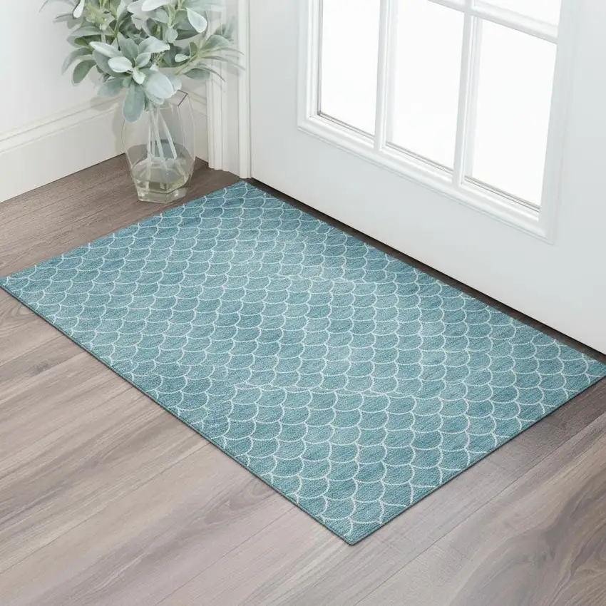 Teal And Ivory Geometric Washable Area Rug With UV Protection Photo 1