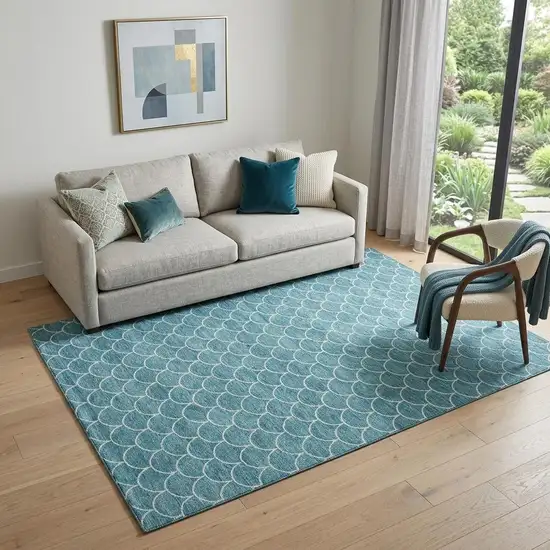 Teal And Ivory Geometric Washable Area Rug With UV Protection Photo 1