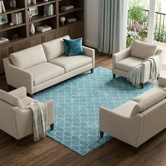 Teal And Ivory Geometric Washable Area Rug With UV Protection Photo 1