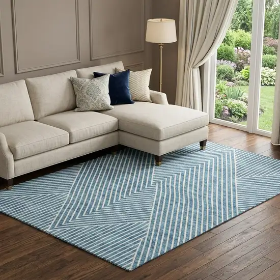 Teal And Ivory Geometric Washable Area Rug With UV Protection Photo 1