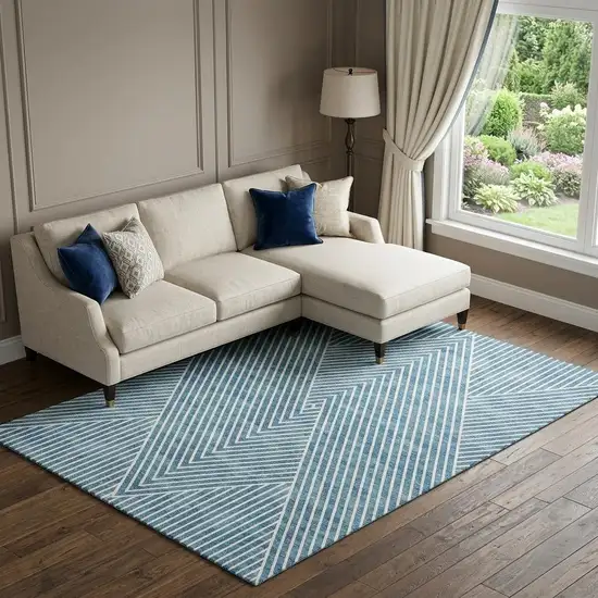 Teal And Ivory Geometric Washable Area Rug With UV Protection Photo 1