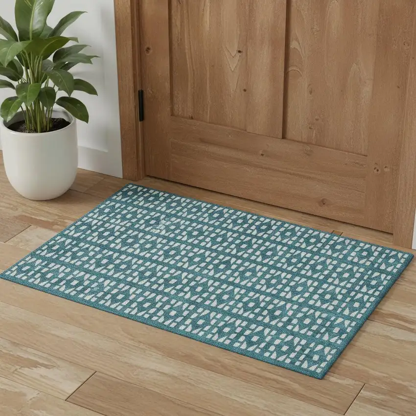 Teal And Ivory Geometric Washable Area Rug With UV Protection Photo 1
