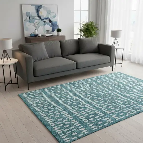 Teal And Ivory Geometric Washable Area Rug With UV Protection Photo 2