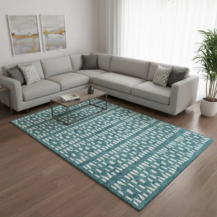 Teal And Ivory Geometric Washable Area Rug With UV Protection Photo 2
