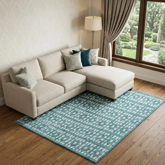 Teal And Ivory Geometric Washable Area Rug With UV Protection Photo 1