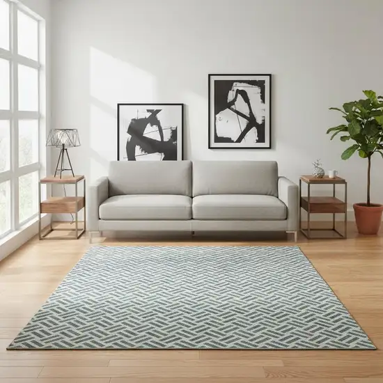 Teal And Ivory Geometric Washable Area Rug With UV Protection Photo 2