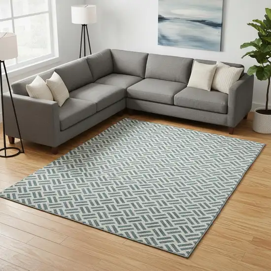 Teal And Ivory Geometric Washable Area Rug With UV Protection Photo 2