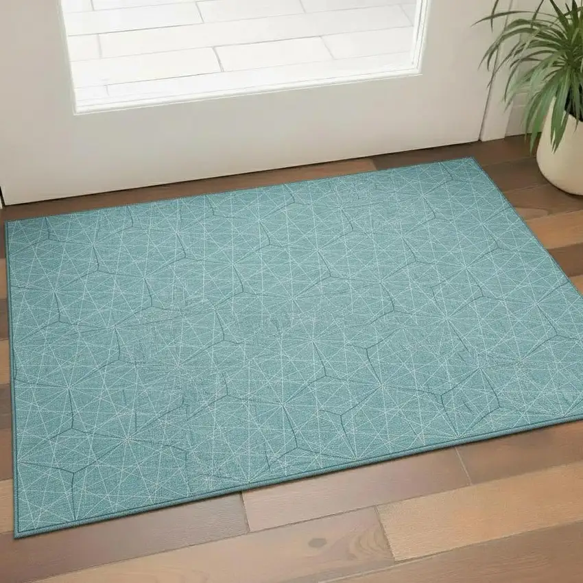 Teal And Ivory Geometric Washable Area Rug With UV Protection Photo 2