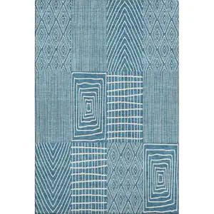 Photo of Teal And Ivory Geometric Washable Area Rug With UV Protection