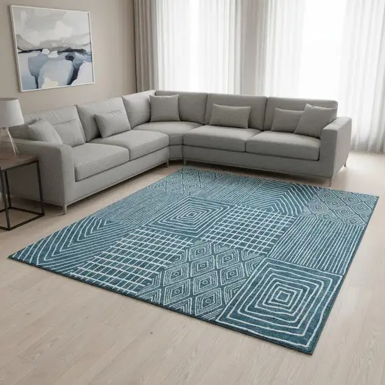 Teal And Ivory Geometric Washable Area Rug With UV Protection Photo 2