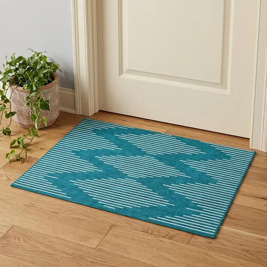 Teal And Ivory Geometric Washable Area Rug With UV Protection Photo 1