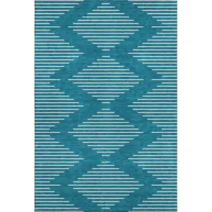 Photo of Teal And Ivory Geometric Washable Area Rug With UV Protection