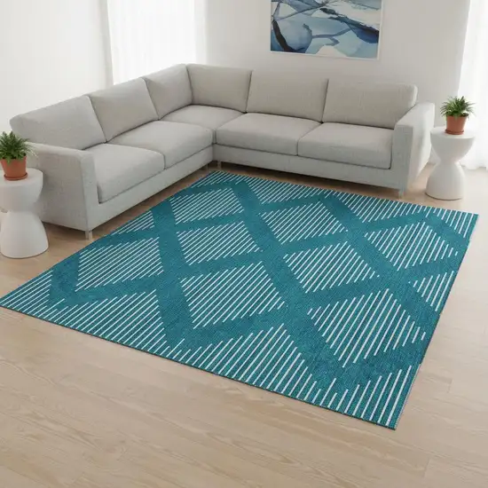 Teal And Ivory Geometric Washable Area Rug With UV Protection Photo 2