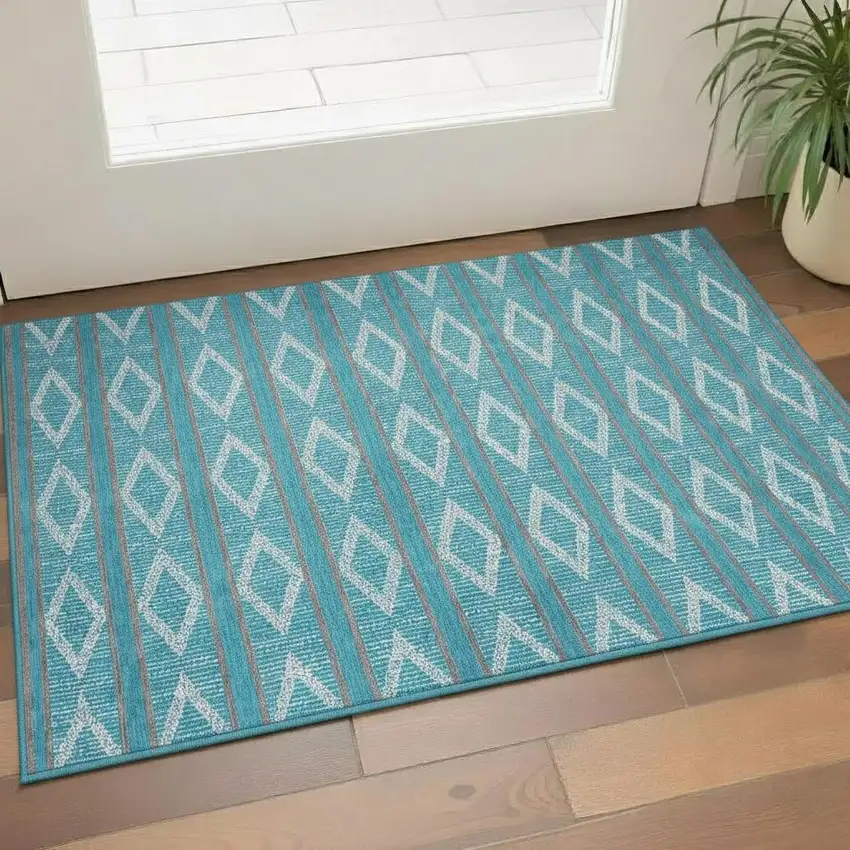 Teal And Ivory Geometric Washable Area Rug With UV Protection Photo 2