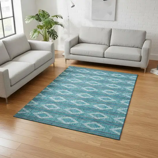 Teal And Ivory Geometric Washable Area Rug With UV Protection Photo 2