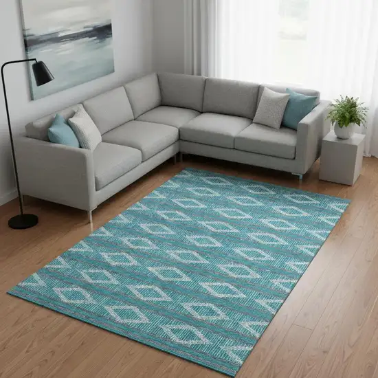 Teal And Ivory Geometric Washable Area Rug With UV Protection Photo 2