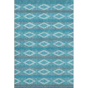 Photo of Teal And Ivory Geometric Washable Area Rug With UV Protection