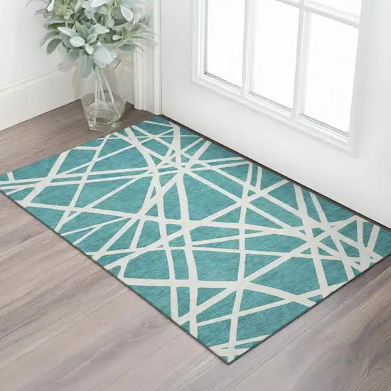 Teal And Ivory Geometric Washable Area Rug With UV Protection Photo 2