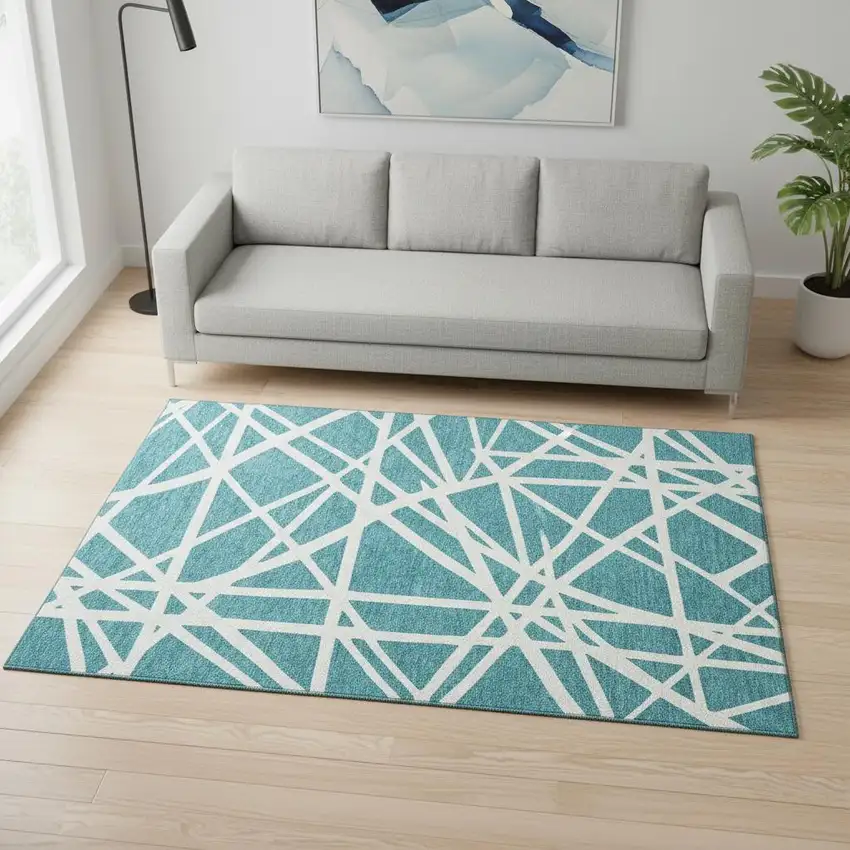 Teal And Ivory Geometric Washable Area Rug With UV Protection Photo 2