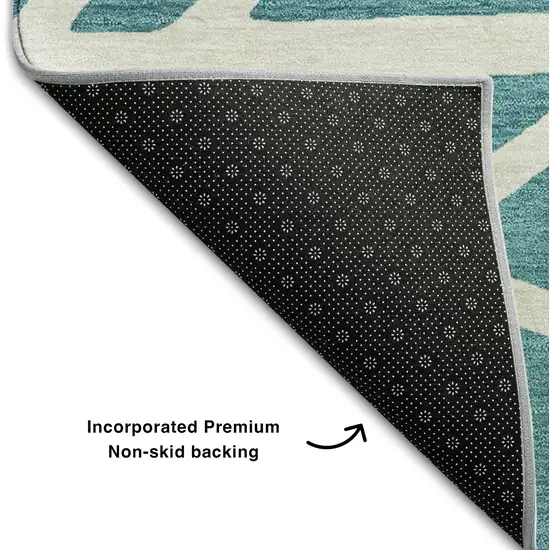 Teal And Ivory Geometric Washable Area Rug With UV Protection Photo 5