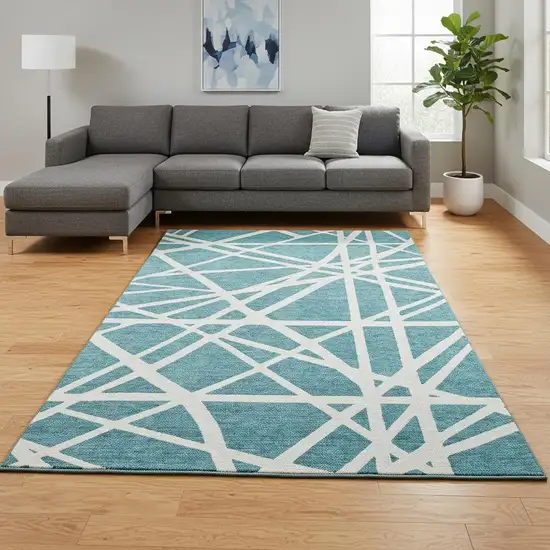 Teal And Ivory Geometric Washable Area Rug With UV Protection Photo 2