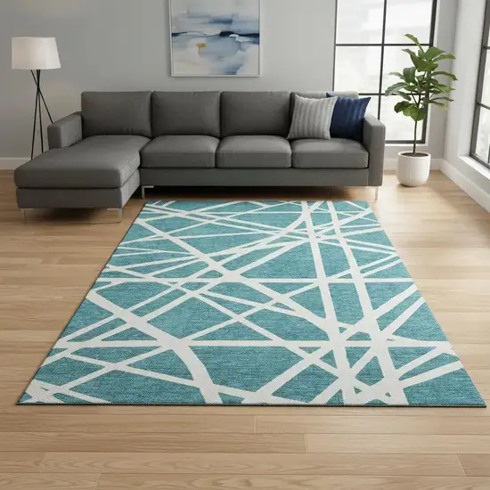 Teal And Ivory Geometric Washable Area Rug With UV Protection Photo 2
