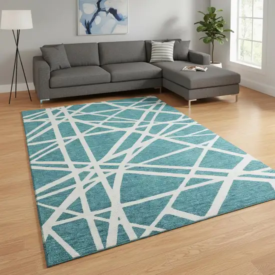 Teal And Ivory Geometric Washable Area Rug With UV Protection Photo 2
