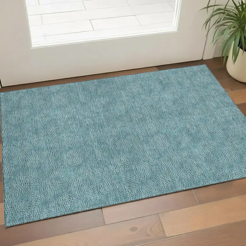 Teal And Ivory Geometric Washable Area Rug With UV Protection Photo 1