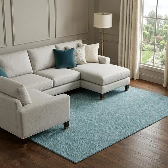 Teal And Ivory Geometric Washable Area Rug With UV Protection Photo 1