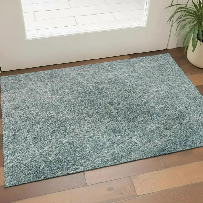 Teal And Ivory Geometric Washable Area Rug With UV Protection Photo 2