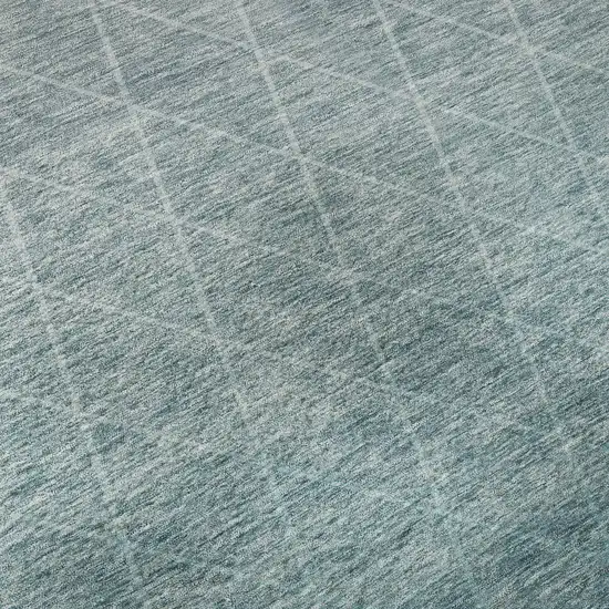 Teal And Ivory Geometric Washable Area Rug With UV Protection Photo 1