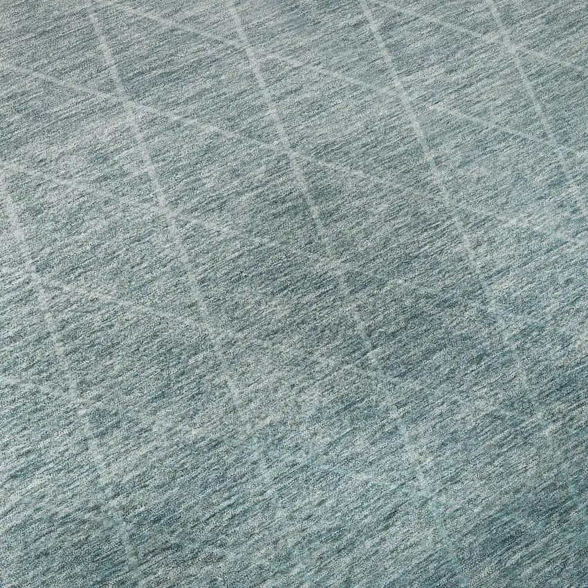 Teal And Ivory Geometric Washable Area Rug With UV Protection Photo 1