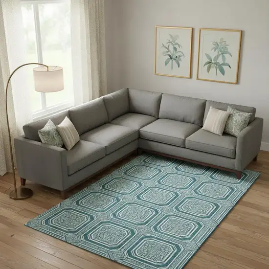 Teal And Ivory Geometric Washable Area Rug With UV Protection Photo 2