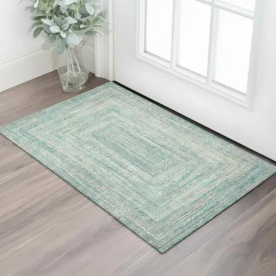Teal And Ivory Geometric Washable Area Rug With UV Protection Photo 2