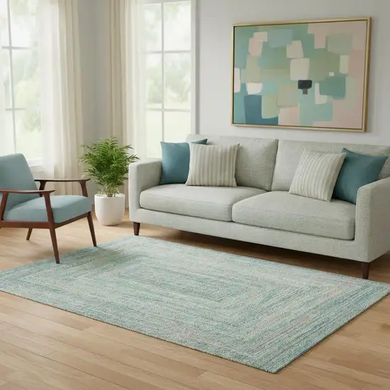 Teal And Ivory Geometric Washable Area Rug With UV Protection Photo 2